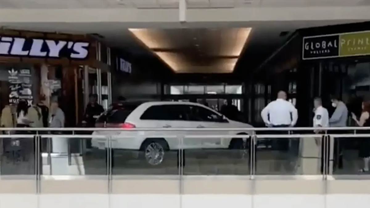 Old Woman Drives Car into Second Floor of Mall