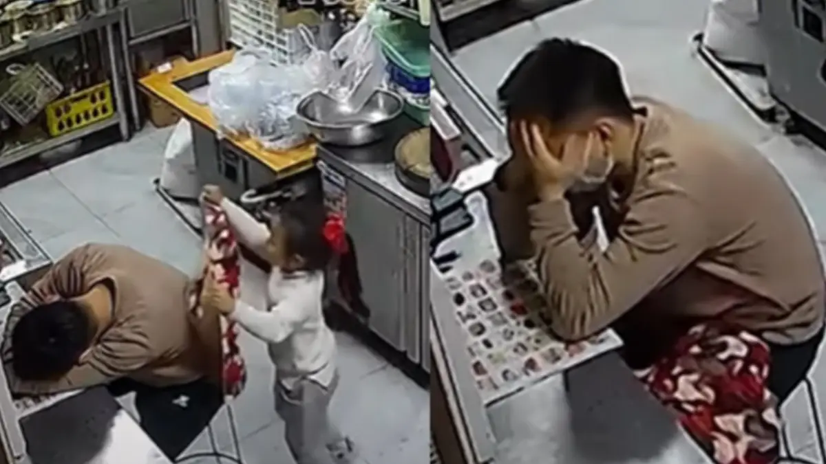 A Father Weeps After His Daughter Covers Him with Her Small Jacket